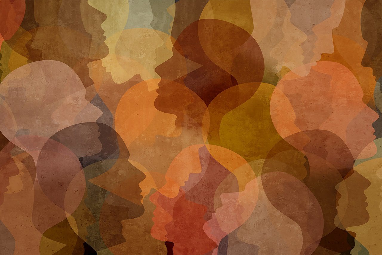 Multiple silhouettes of heads representing society