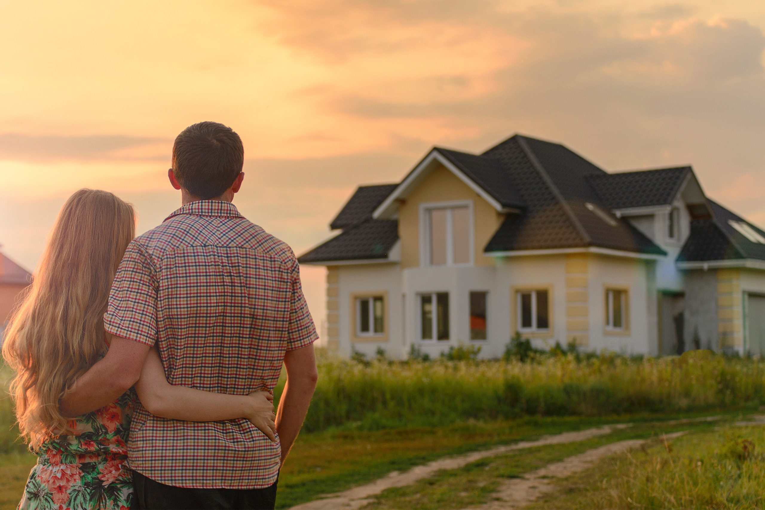 Couple looking at a house together